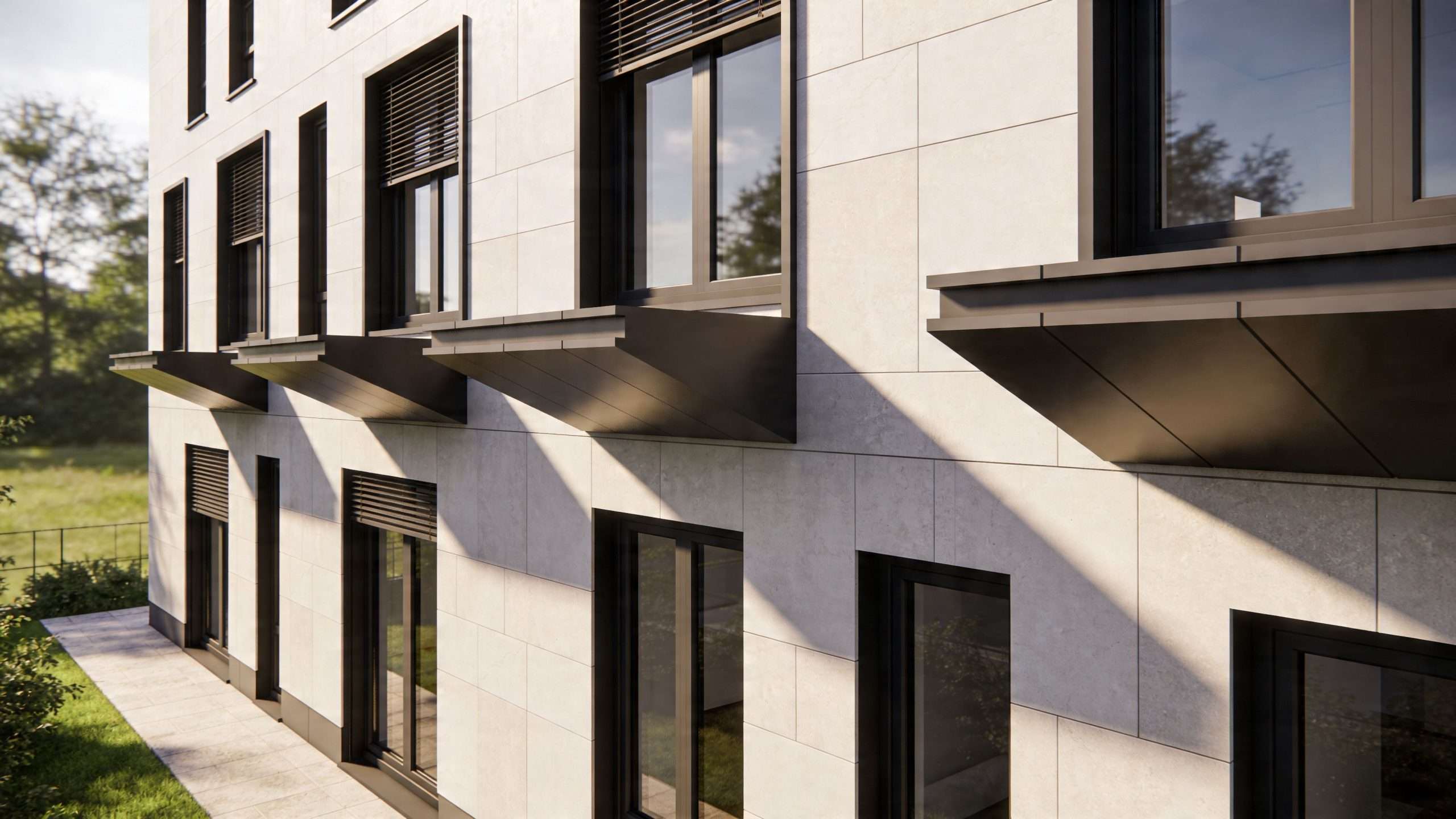 A modern building exterior featuring clean stone panels, sleek black window frames, and structural decorative awning details.
